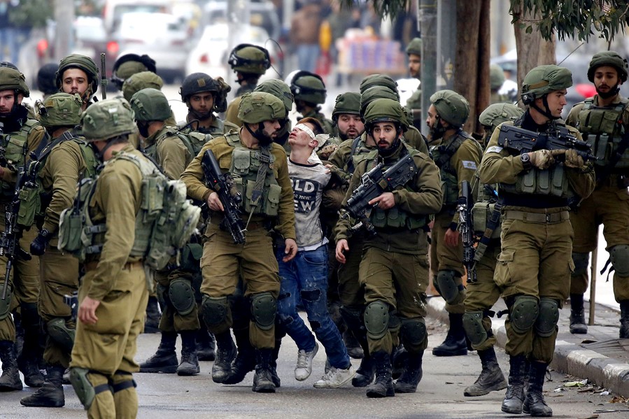 APA Images/REX / Shutterstock editorial / NTB  THAT, RECOGNISING, DECISION, PALESTINIAN, ARMY, WEST, 07, ISRAEL, PALESTINE, UNREST, CLASHES, PROTESTERS, FORCES, DURING, JERUSALEM, MIDDLE, PROTESTING, CLASH, US, RECOGNIZED, TROOPS, GAZA, SOLDIER, BANK, DETAIN, RECOGNISE, SOLDIERS, 66994278, AS, FOLLOWED, RIOTING, PROTESTS, CRISIS, TRUMP, Demonstration, RECOGNIZING, A, TERRITORIES, RECOGNISED, S, PROTESTER, U, BY, FORMALLY, EAST, Military, ISRAELI, DEC, HEBRON, WITH, AMERICAN, DONALD, DETAINING, AGAINST, 2017, Not-Personality, PRESIDENT, War & Conflict, SECURITY, RIOT, ANTI, CAPITAL, PROTEST